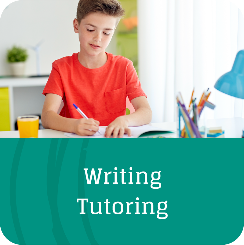 boy practicing writing skills learned in tutoring